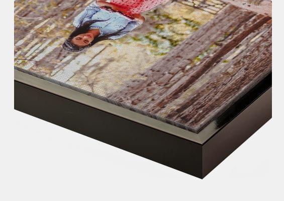 canvas print in black-glossy frame closeup front