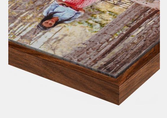 canvas print in walnut flair frame closeup front