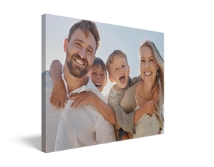 corner of canvas print on frame showing photo of girl and dog on rocks