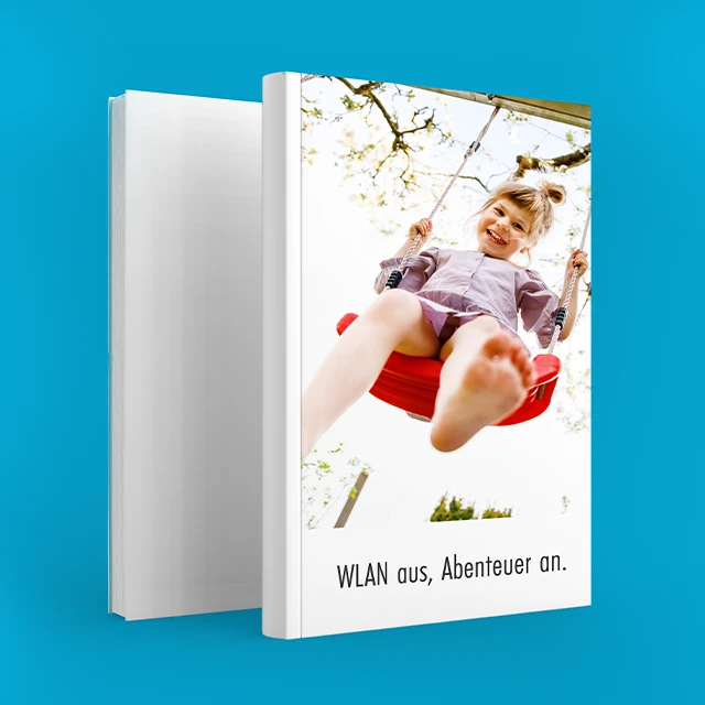 Baby Fotobuch mit fröhlichen Kinderbildern – kreative Gestaltungsideen für Familienabenteuer.