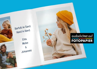 Aufgeschlagenes Echtfotobuch mit Familienfotos, ausbelichtet auf Fotopapier